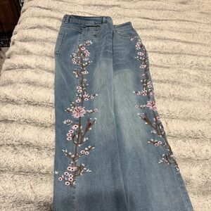 Beautiful cherry blossom embroidery on both sides of this denim